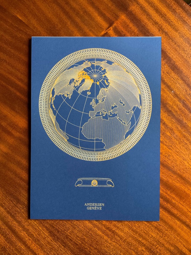 Le globe · or sur papier bleu