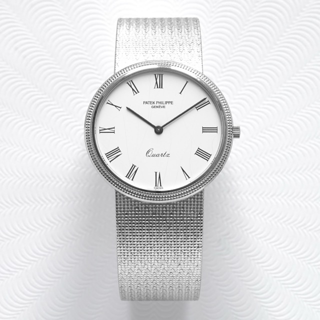 Patek Philippe Calatrava or gris sur papier gravé